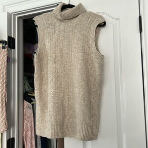 NWOT Folded turtleneck
Ribbed knit neck and hem, cable knit front
Imported